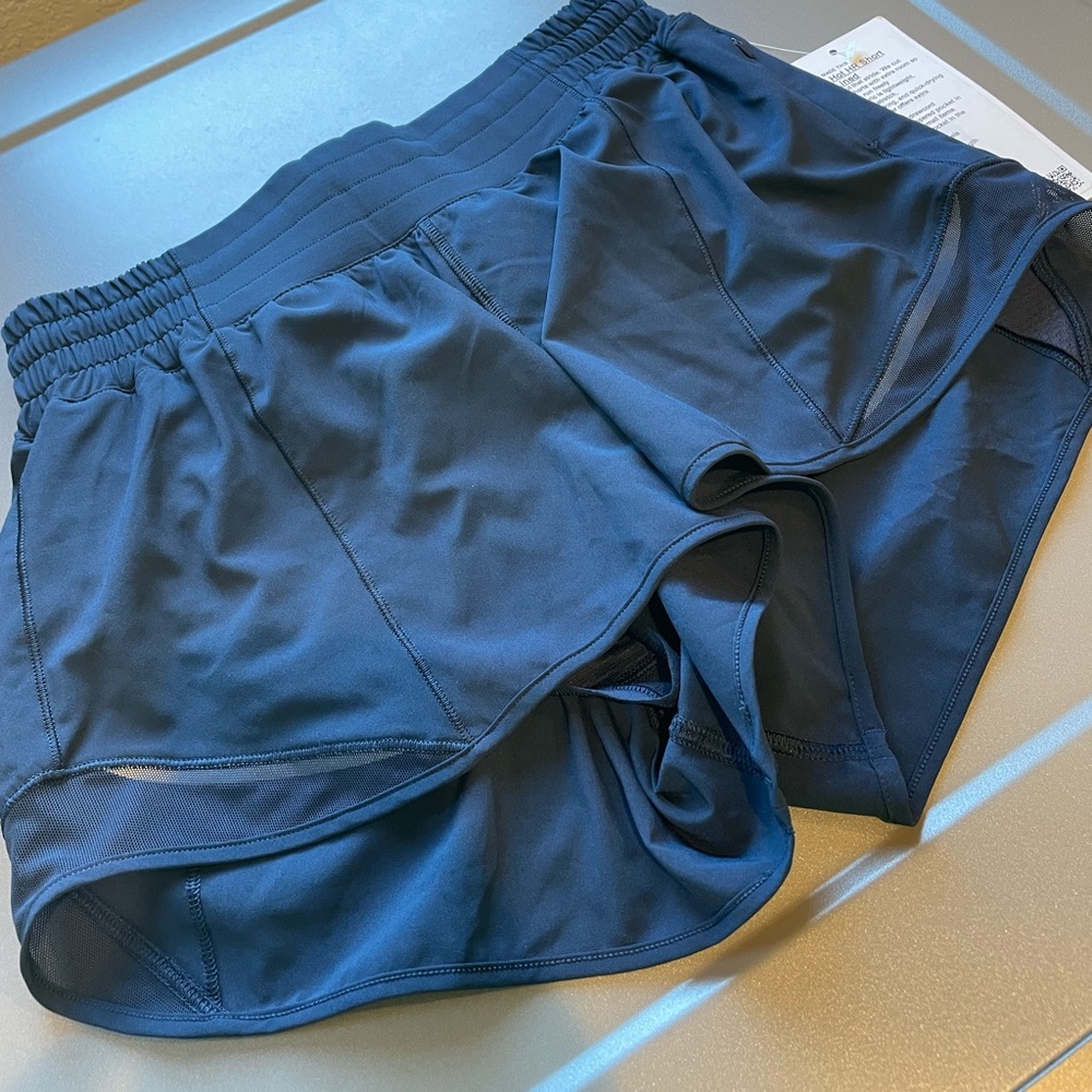 Lululemon high rise hotty hot shorts. True Navy NWT size 6 with 2.5 inseam.